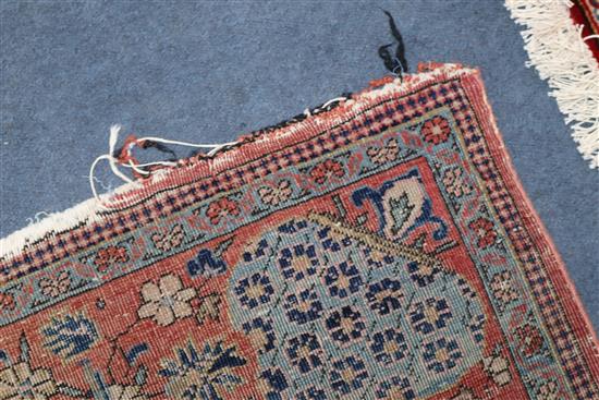 A Tekke Bokhara rug and a similar smaller rug 200 x 128cm and 165 x 95cm